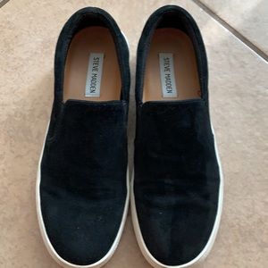 Women’s black Steve Madden slip ons
